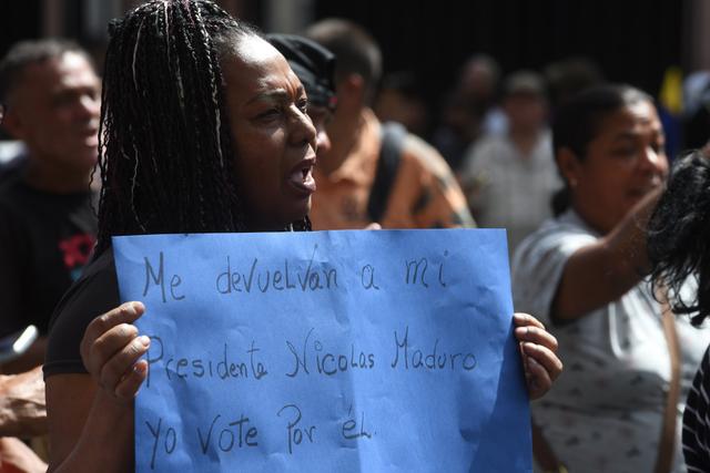 第1现场|遭袭后的委内瑞拉:药店排队、油站关闭、民众集会抗议 第2张 第1现场|遭袭后的委内瑞拉:药店排队、油站关闭、民众集会抗议 第2张